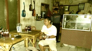 The nice guy, playing one of the little guitars