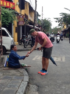 Me buying a Tiger Balm from a blind one legged man. He didn't beg, he sold tiger balm. He dealt with what life have given him, and he earned my respect for that.