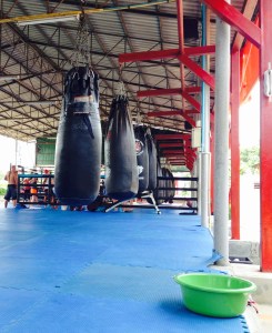 Bags ready to be punched. And the little green water bucket used to disinfect your feet before stepping onto the mats.