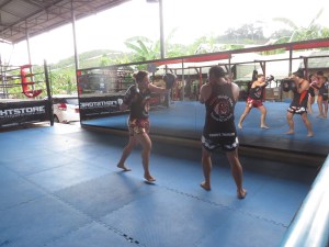 Katja doing pad work. Charging up for a left kick